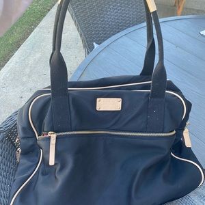kate spade overnight/weekend bag. i used it for a diaper bag. great condition